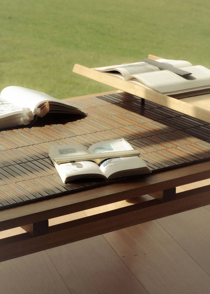 Solid brass book weight by STUDIO HENRY WILSON.