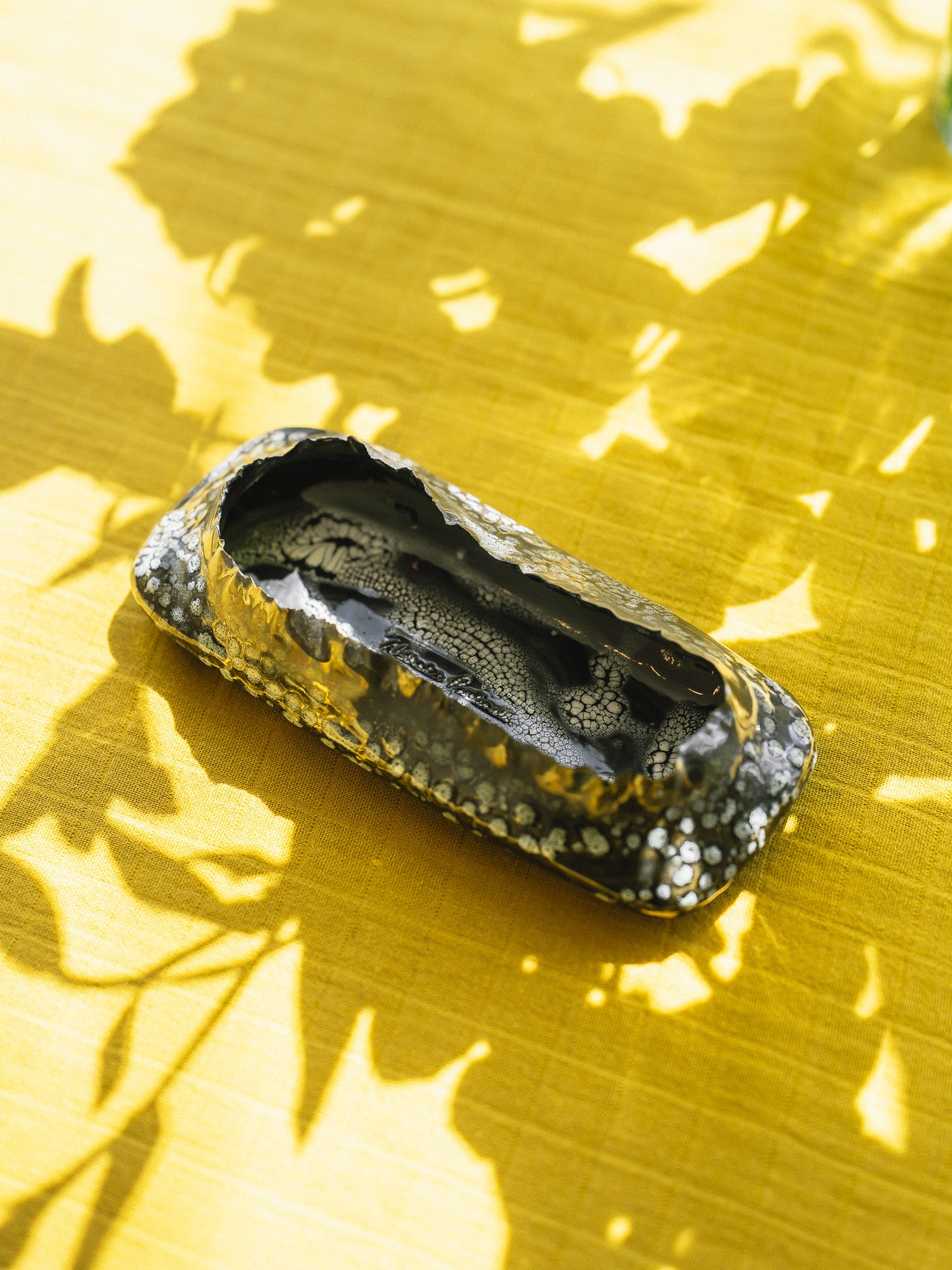 Ceramic decorative dish by Nathalee Paolinelli.