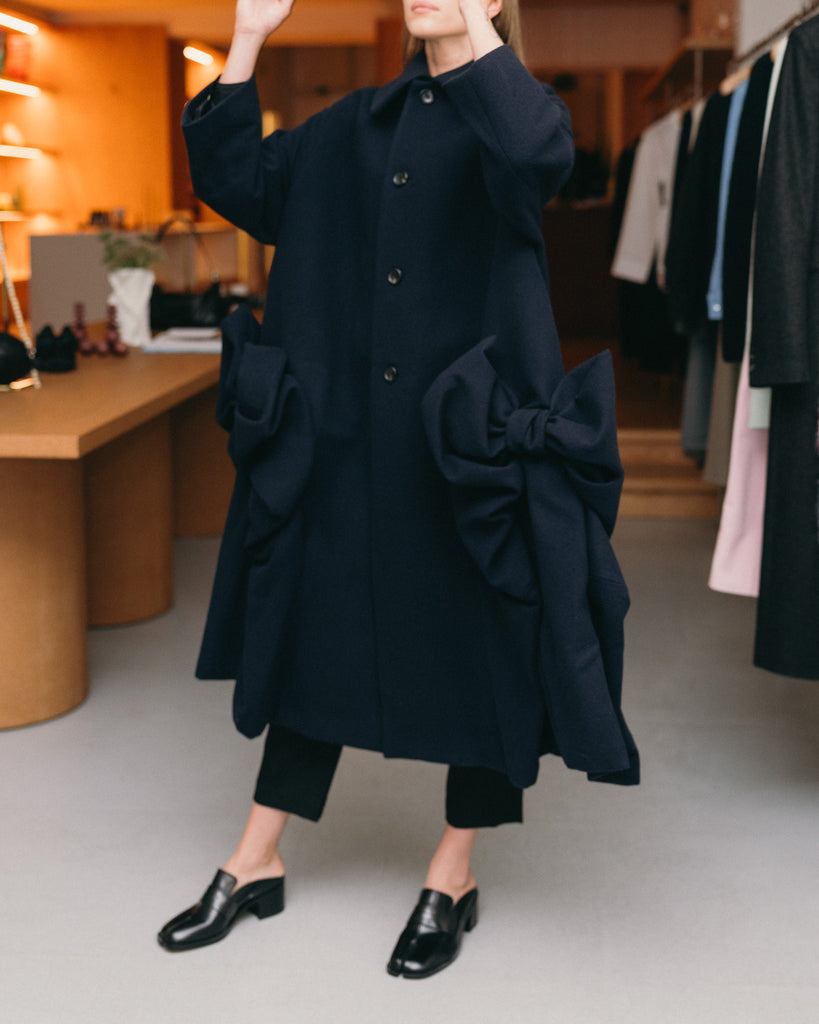 Long Bow Coat from COMME DES GARCONS.